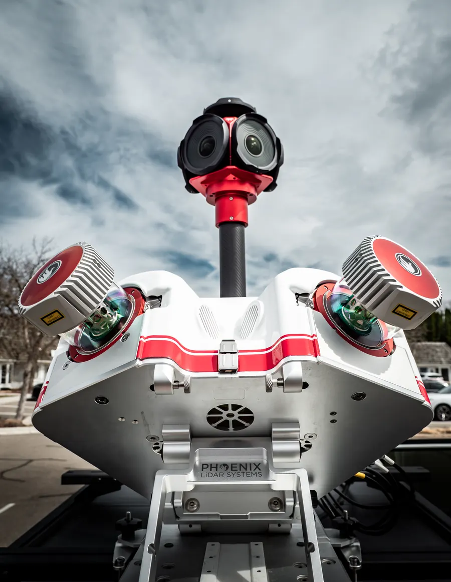 Vehicle-mounted mobile LiDAR system with twin scanners and a 360 degree camera array